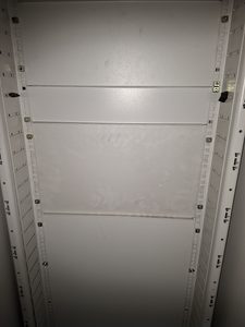 Black dust contamination on Data Hall cabinet blanking panel despite ISO Class 8 airborne compliance